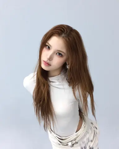 MAI in a white top